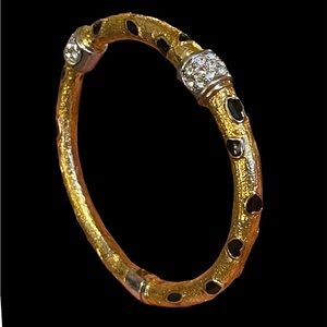 Signed pave set diamanté black enamel gold tone magnetic hinged bangle bracelet